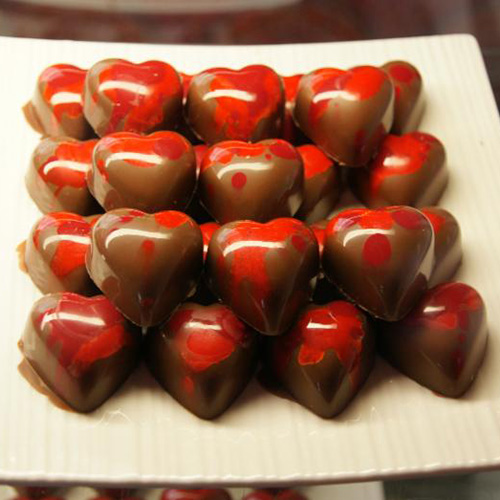 Red chocolates shaped like hearts.