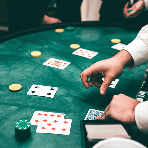 A hand deals cards at the Shorelines Casino Thousand Islands